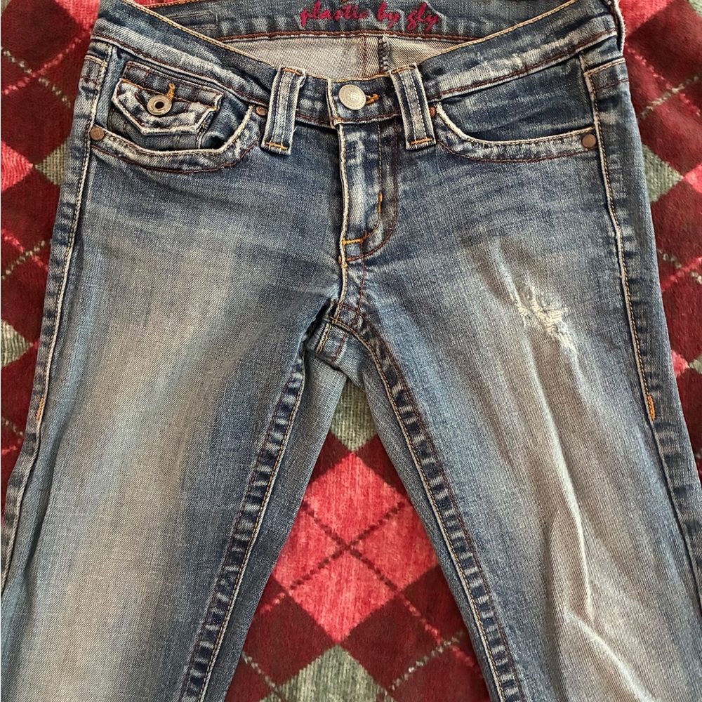 plastic by gly bootcut low rise jeans